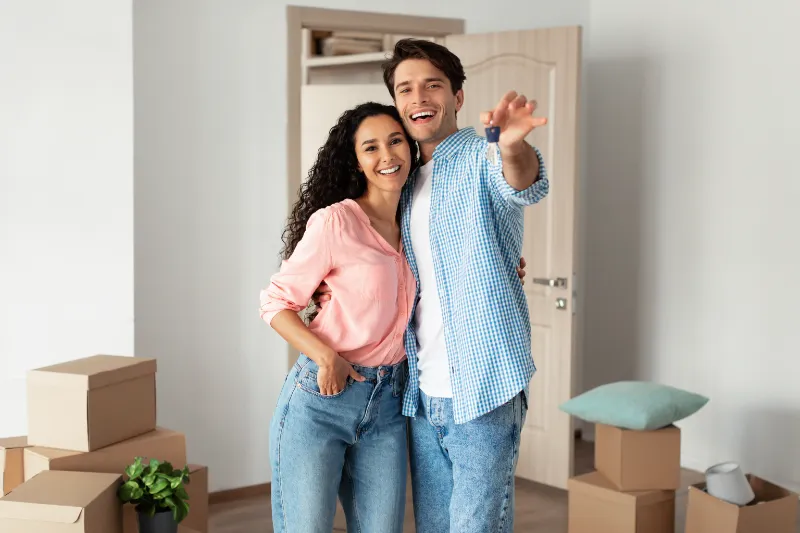 Couple with new home keys