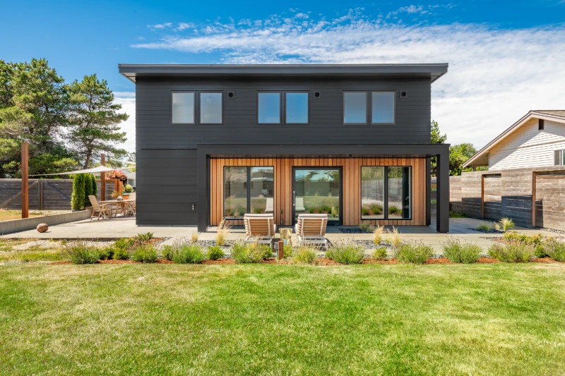 Contemporary home exterior with black metal siding